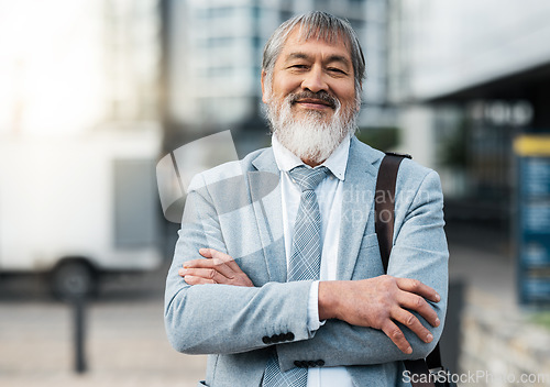Image of Mature Japanese businessman, arms crossed or city travel by office building street or public transport station. Portrait, smile or happy corporate manager, asian ceo or leadership with success goals