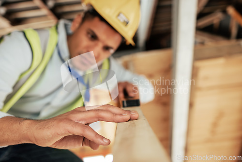 Image of Carpenter, construction and project with wood, man and DIY with development in his home for building, renovation and builder. Carpentry, contractor and maintenance work with a young male handyman