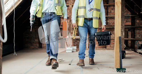 Image of Walking, construction and teamwork with an engineer and designer working on a building site. Industry, developer and collaboration with a construction worker and engineering professional at work