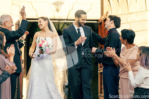 Image of Wedding, celebration and love of family and friends while outdoor to support couple on their wedding, union and commitment at church. Happiness, love and crowd celebrate marriage of man and woman