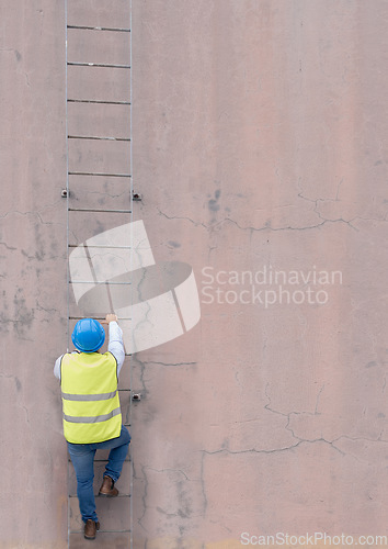 Image of Engineer, building and man climbing ladder to get to roof or construction site. Engineering, safety and male maintenance, repair or installation contractor or worker going up steps on wall mock up.