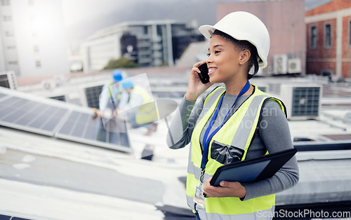 Image of Solar energy, solar panels and electrician on a phone call networking, talking or speaking to a technician. Engineering, roof and happy woman in conversation or communication about renewable energy