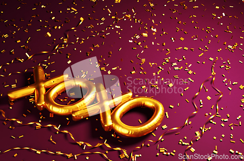 Image of Golden xoxo foil balloon on pink background with gold glitter co