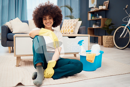 Image of Happy black woman, cleaning living room and relax taking break from housework, home hygiene routine and spring clean. Fresh household detergent, hygiene chemicals and domestic work with latex gloves