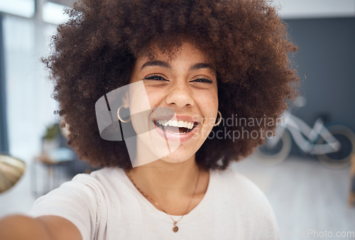 Image of Portrait selfie, black woman and video call in home for social media, online network or influencer vlog. Happy, smile or laughing young african girl with afro, curly hair and happiness relax in house