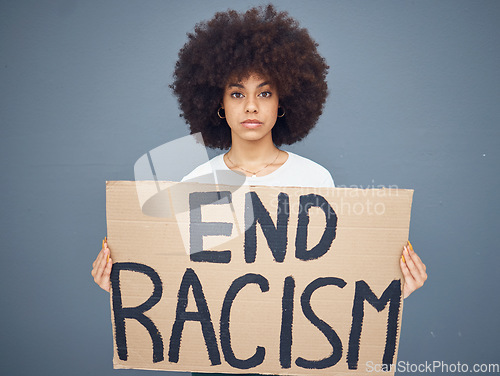 Image of Portrait of black woman, end racism and protest banner for activism, freedom support or racial independence. African american person, protesting board and proud diversity in grey background studio