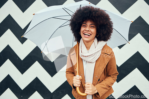 Image of Creative, fashion and black woman with umbrella in city standing by black and white pattern wall. Beauty, happiness and girl enjoying weekend, freedom and holiday in urban town by monochrome design