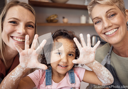 Image of Hands, family and children with a girl baking in the kitchen of her home with mother and grandmother. Kids, cooking and chef with a woman, daughter and parent learning how to bake together in a house