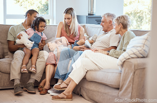 Image of Love, children with grandparents in a big family as mother and father play with kids on the sofa or couch. Dad mom and young kids happy to enjoy bonding with lovely grandmother and senior man in home