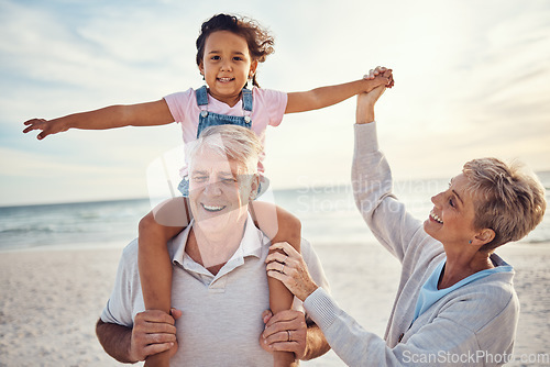 Image of Beach, family and grandparents piggy back for holiday fun together with grandchild in Australia. Summer, ocean and vacation afternoon with happy senior grandma, grandfather and young kid.