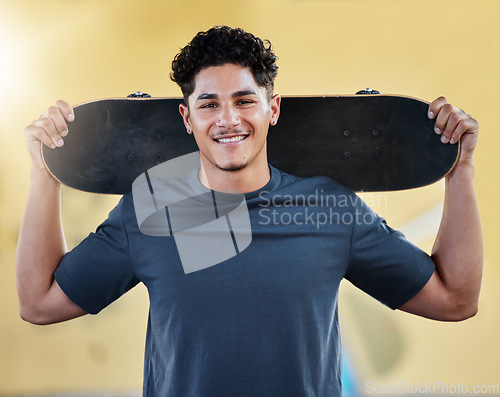 Image of Portrait, skater and skateboard happy man, smile and confident to practice, for health and fun. Athletic, young male, being casual ready to skate outdoor training, happiness and relax in street.