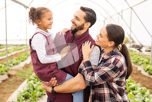 Image of Happy, farm and agriculture with family together with vegetable, sustainability garden and love. Nature, parents and happiness with child, mother and father in a farming greenhouse or countryside