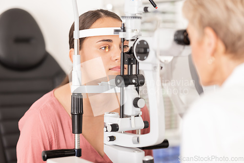 Image of Eye, optometrist and eye exam in ophthalmologist office with optical machine to examine vision weak iris, pupil or lens of eyeball. Woman, optical clinic test and professional optician eye care test