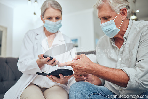 Image of Covid, doctor or man in diabetes test on glucometer strip in nursing home lockdown or house living room. Retirement senior, diabetic patient or blood glucose insulin management and covid 19 face mask