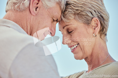 Image of Senior, couple with forehead touch and smile for love with care, bonding and retirement outdoor. Elderly man, woman and happy for romance closeup with embrace, happiness and face to face in summer