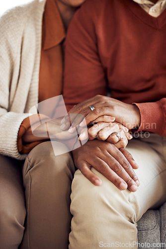 Image of Love, black couple and holding hands together for marriage, quality time and happiness for bonding and retired. Retirement, African American man and woman with romantic hand gesture and anniversary.