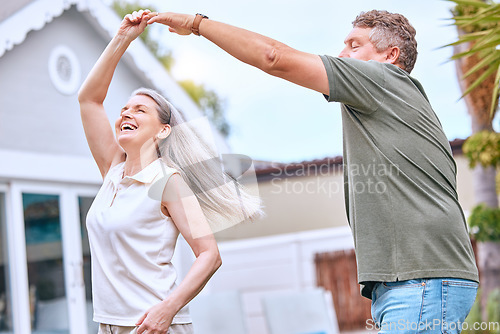 Image of Senior couple, dancing and happy retirement in summer backyard garden for romance, quality time or relax together. Elderly man, smile woman and dance for anniversary, love and joy celebration outdoor