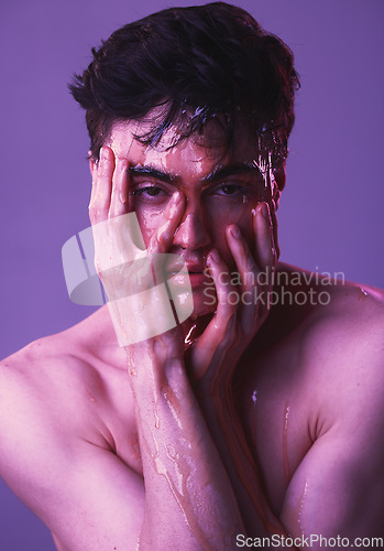 Image of Honey, skincare and face model in studio portrait for facial mask, cosmetics and beauty aesthetic in purple. Dermatology, art or skin care of young man with natural face mask in a creative headshot