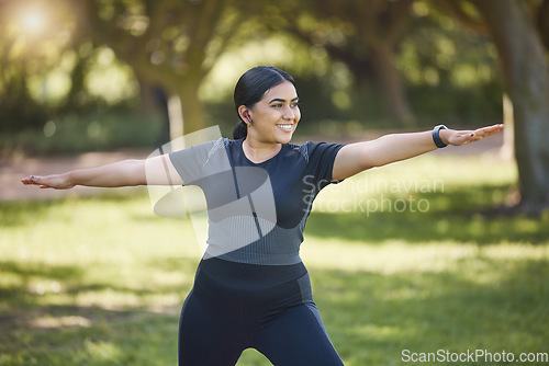 Image of Woman, music earphones and yoga in park, nature environment or sustainability location for wellness, health or body mobility. Smile, happy or stretching yogi listening to zen podcast or mindset radio