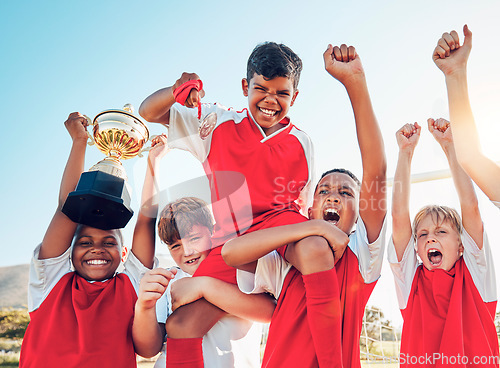 Image of Soccer, celebration and kids team with trophy on soccer field, happy and excited at winning game. Sports, boy children goal and success in teamwork at football with gold medal award with winner smile