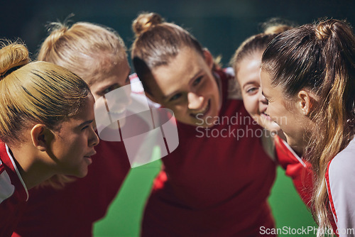 Image of Women, football and team huddle on field at soccer game, motivation and team building for girl sports. Fitness, training and happy girls talk at soccer match in support of winning teamwork and goals.