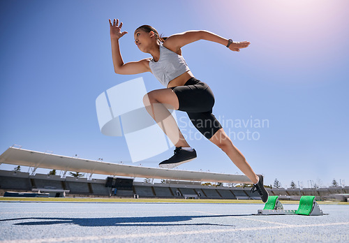 Image of Woman runner, running and training on track, workout and exercise for race, marathon and sport in stadium. Speed, sports and fitness athlete with cardio, sprinter and run fast for competition