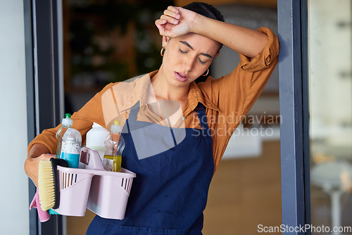 Image of Spring cleaning, tired and sad woman headache, burnout and stress, frustrated and mental fatigue. Exhausted maid cleaner in pain, problem and pressure of housekeeping service, routine task and crisis