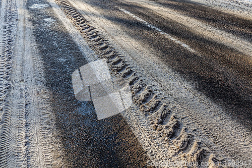 Image of narrow winter road , closeup