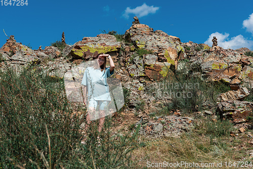 Image of woman in Altai mountains, beauty summer day