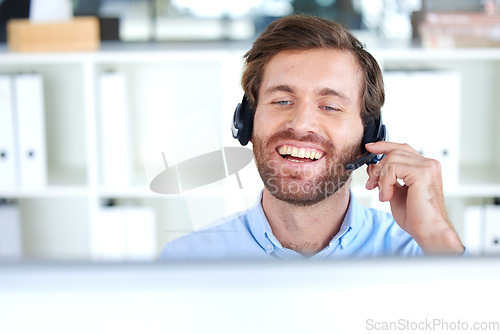 Image of Call center, consulting and communication with businessman at computer for telemarketing, customer support and sales. Help desk, contact us and phone call with employee in office for crm consultant