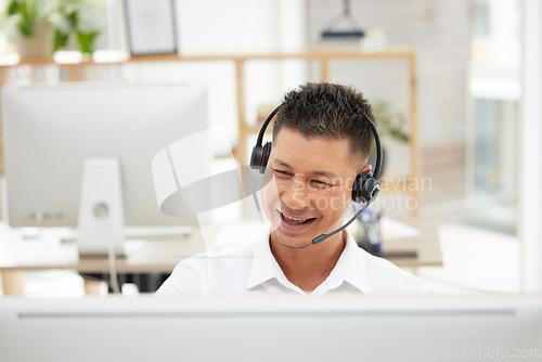 Image of Call center, customer support and agent consulting online with a crm strategy on computer in office. Customer service, contact us and telemarketing consultant working on ecommerce sales in workplace.
