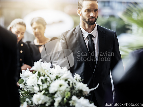 Image of Death, funeral and carry coffin with family mourning, sad and depressed for grieving time. Grief together, mental health and man holding casket for church service, memorial and difficult for loss.