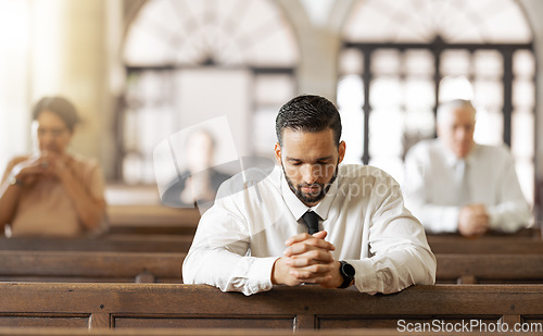 Image of Church, prayer and man praying to God, worship or religion in cathedral. Faith, spiritual and christian community in chapel or sanctuary worshipping Jesus, holy praise or trust and hope in Christ.