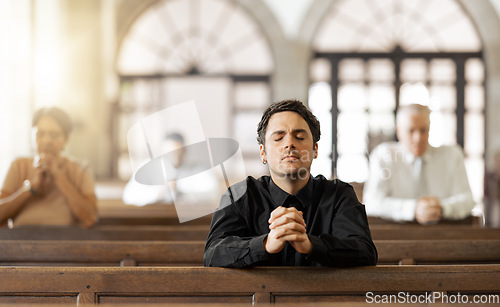 Image of Prayer, religious and young man in church with congregation, faithful and hands together. Religion, male and worship in tabernacle for guidance, spiritual and support with closed eyes and praying