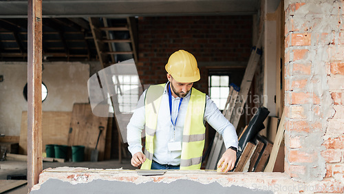 Image of Construction, building manager man and handyman contractor measure on architect project. Industrial, engineer or construction worker planning and working on architecture design and builder logistics