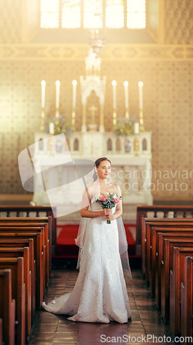 Image of Wedding, bride and in white dress in church for celebration, happiness and confident in temple, for marriage and joy. Young female, bouquet and married being calm, content and happy for relationship.