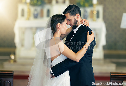 Image of Wedding dance, love and couple dancing together with a hug after getting married at celebration reception for event. Bride, groom and marriage commitment in Christian church, a suit and wedding dress