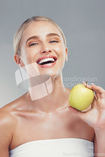 Image of Apple, beauty and portrait of health woman with fruit for body care, antioxidants and healthy weight loss diet. Aesthetic model with nutritionist food for diy facial acne treatment, skincare or detox