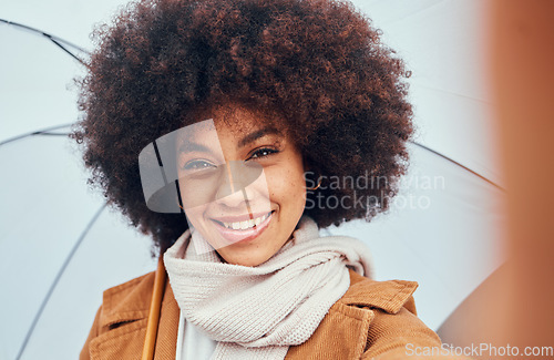 Image of Woman, selfie closeup and umbrella in rain, water or drizzle in portrait, happiness and smile. Black woman, hair or afro beauty with parasol for protection from elements, climate or storm while happy