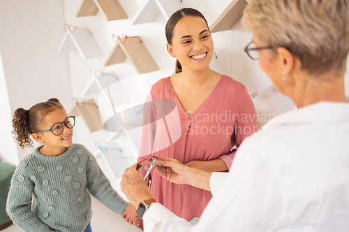 Image of Happy mother, child and and optometrist with glasses eye exam for eyesight, eyes wellness and healthy vision. Girl with mother, eyecare store and shopping eyewear, spectacles or prescription lenses