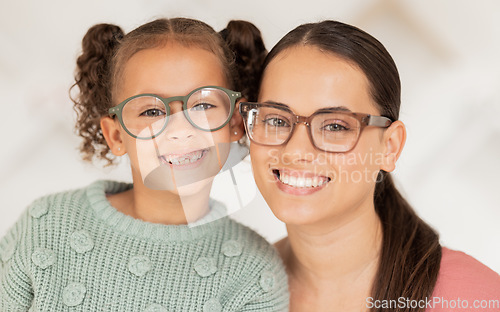 Image of Mother, girl and glasses in optometry shop, frame and happy after shopping in retail store with smile for vision result. Portrait of latino mom, child and happiness with optical lense at optometrist