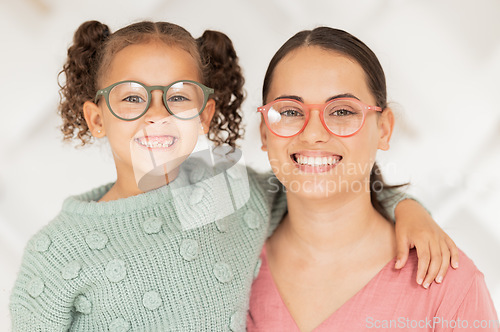 Image of Mom, daughter smile and glasses portrait for strong eyes, vision and optical health with white background. Mother child happiness, happy together for eyeglasses and wellness, seeing and healthy sight