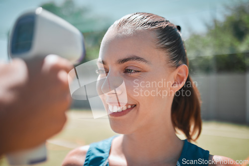 Image of Sports woman check forehead with thermometer, fever test and covid 19 health safety risk on outdoor court. Active, fitness and young female, corona virus compliance and symptoms on infrared laser gun