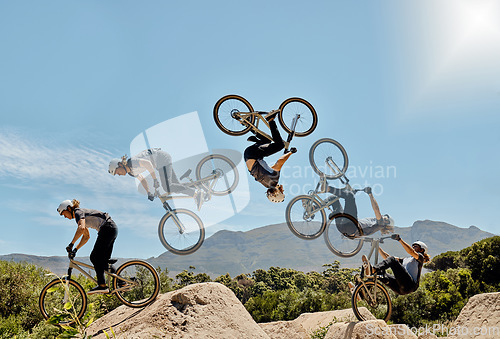 Image of Cycling, mountain bike and jump for sports speed trick in training adventure outdoors. Exercise bike, freedom and healthy man on fitness workout for active cardio lifestyle motivation in nature