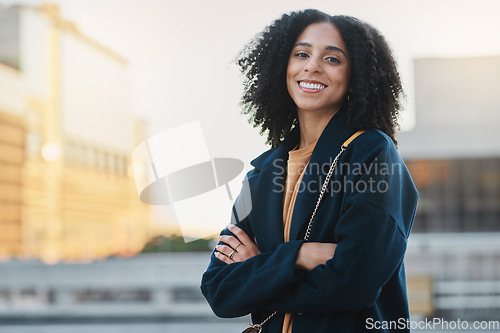 Image of Black woman, city and smile portrait of a person by and urban building feeling relax and happy. Travel, freedom and happiness of a young female outdoor with a bag ready for traveling or work