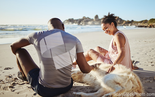 Image of Fitness couple relax with dog at beach, sand and ocean after summer workout, free time and fun in sunshine together. Happy man, woman and people, labrador animal pets and freedom at calm sea outdoors