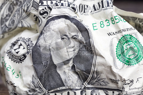 Image of one crumpled American dollars
