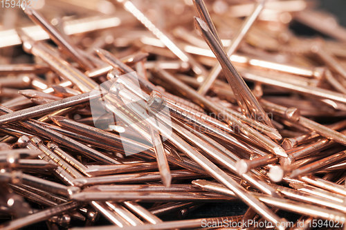 Image of orange copper nails for decorative work