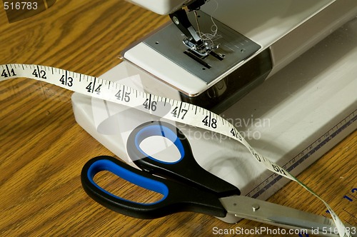 Image of Sewing Machine, Scissors, And Tape Measure