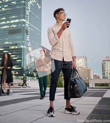 Image of Man, phone and city travel for business or vacation walking in street, search directions or social media content creation. Black man, global internet streaming on smartphone and thinking with luggage